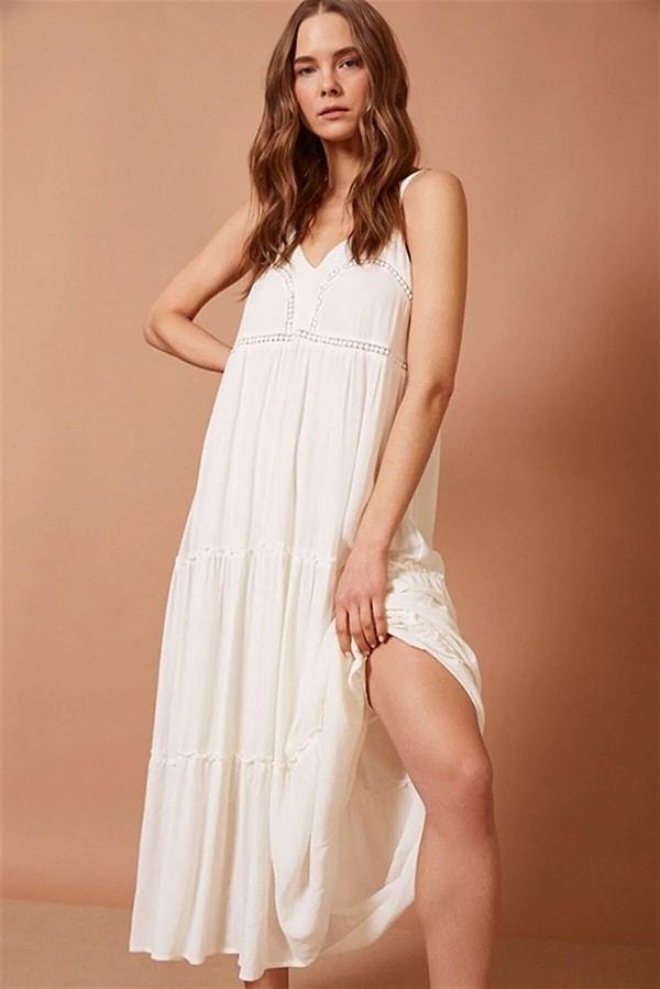 8. İşlemeli beyaz elbise