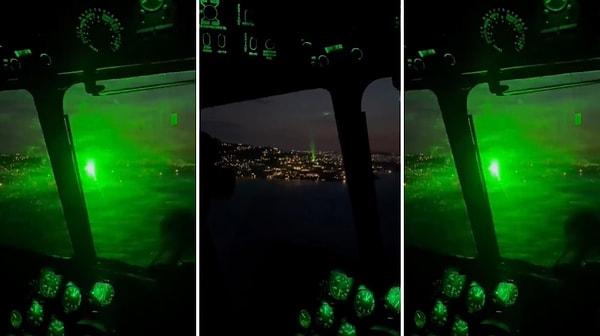 Helikopter içinden kaydedilen görüntülerde, helikoptere doğru gelen yeşil renkli bir lazer ışığı görülüyor.
