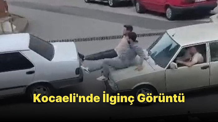 Kaputa Oturup Öndeki Aracı Ayaklarıyla İten Yurdum İnsanı