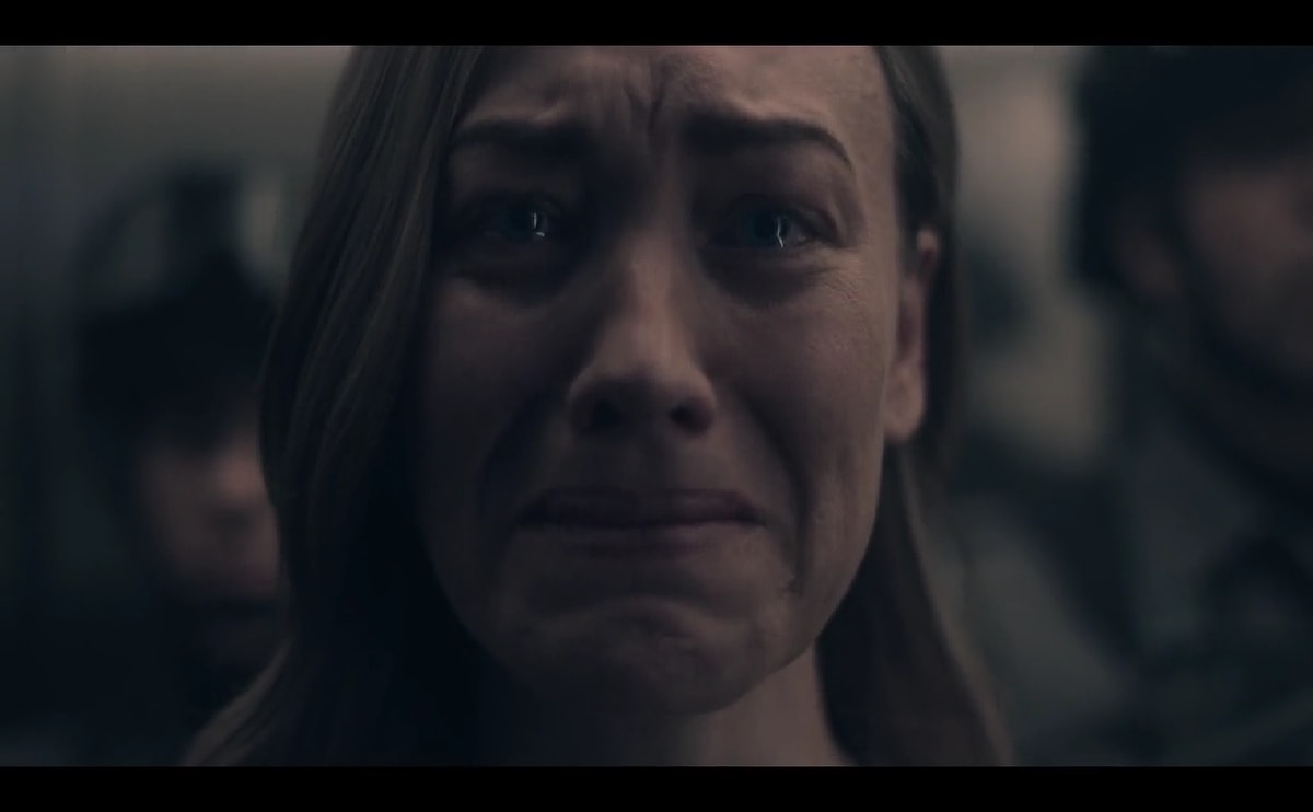 Hannah's Purple Dress In 'The Handmaid's Tale' Speaks Volumes