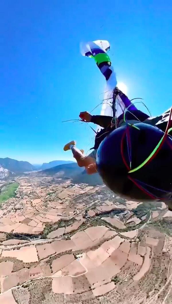 Bir ekstrem sporcusu, paraşütle atlama yaptığı sırada paraşütün ipleri birbirine dolandı. Sporcu havada zor anlar yaşarken hızla yere doğru dalış yapmaya devam ediyordu.