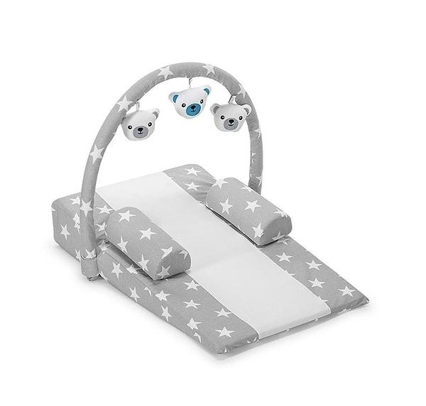 4. Bebeğinizin kusmasını önleyecek, ayrıca içerisinde keyifli vakit geçirmesini sağlayacak bir reflü yatağı...