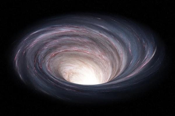 Hepimiz bir kara deliğin bir tür kozmik delik olduğunu biliyoruz: Yerçekimi alanında kapana kısılmaya yetecek kadar yaklaşan her şeyi yutan bir obje.