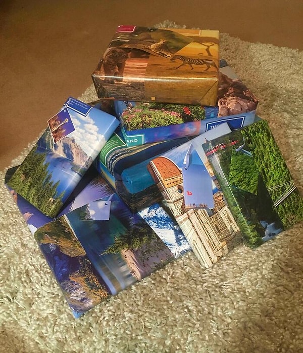 15. Я откопал эту старую брошюру о путешествиях и вырвал красивые фотографии, чтобы завернуть свои подарки