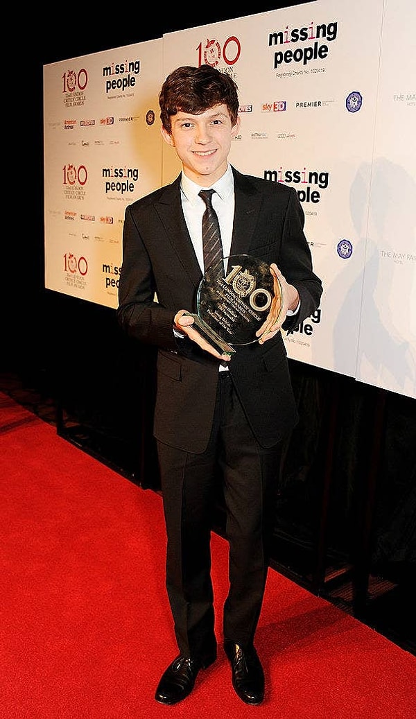 7. Ее нынешний бойфренд Томми Холланд только что вышел из утробы матери.