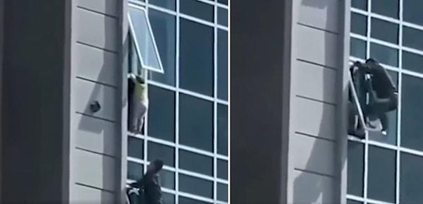 O çocuğu ise alt katta oturan bir adam pencerenin dışına çıkarak hayatını tehlikeye atarcasına kurtardı.