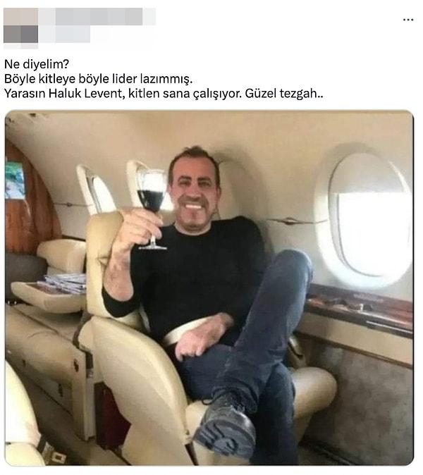 Ancak bir Twitter kullanıcısı Haluk Levent'in bu cevabıyla da yetinmedi... Haluk Levent'i, uçakta şarap içerken çekilen bir fotoğrafıyla vurmaya çalışıp "Kitlen sana çalışıyor. Güzel tezgah..." dedi.