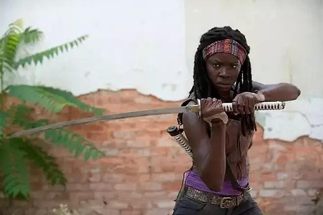 2. Michonne was a solitary survivor who initially did not trust anyone when she first encountered Rick's group in season three.