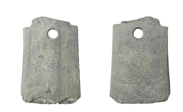 8. Arkeologlar, antik Çin'de ritüellerde kullanılan ve üzerine kaplan deseni işlenmiş balta şeklinde bir silah keşfetti!