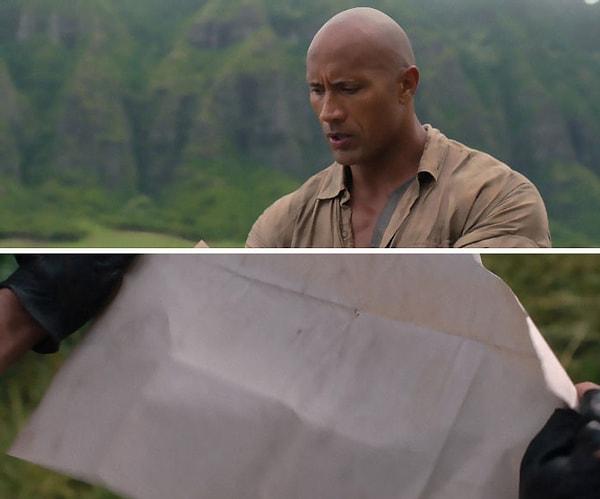 12. Jumanji: Welcome to the Jungle (2017) Dwayne Johnson'ın "taş" anlamında gelen "Rock" karakteri kağıttaki haritayı okuyamıyor. Bunun nedeni "taş kağıt makas" oyununda "taş"ın "kağıdı" yenmesi!