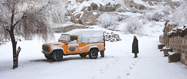 The film's stunning setting in Cappadocia, with its snow-covered landscapes and unique rock formations, sets the stage for the somber and contemplative atmosphere of Winter Sleep.