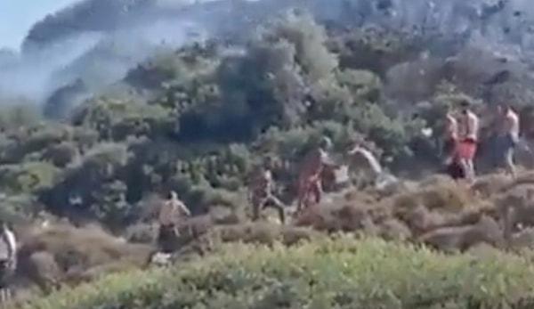 İzmir, Urla'da ormanlık bir alanda mangal yakan bir grup genç yangına sebep oldu.