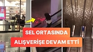 Bir Kadının Su Basan AVM'de Alışverişine Devam Ettiği Anlar Viral Oldu