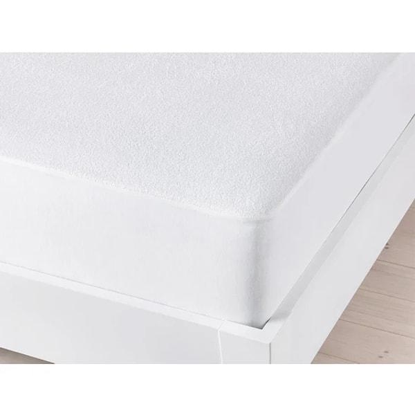 10. Üst yüzeyi yumuşak havlu kumaştan, hiçbir sıvıyı geçirmeyen yapıda fitted yatak koruyucu alez.