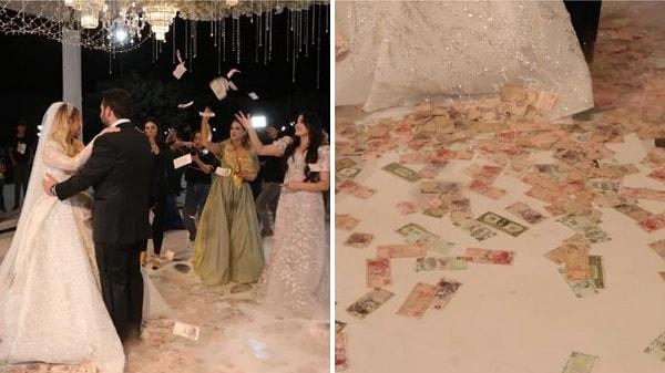 Dolarların havada yağmur gibi yağdığı düğün kısa sürede sosyal medyanın da gündemine oturdu elbette.