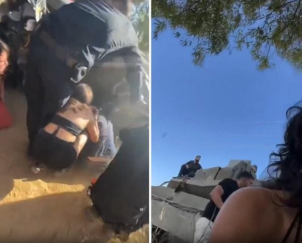 Paylaşılan yeni görüntülerde ise, bir kadının yaşanan tüm o kaosu kaydettiği görülüyor. Görüntülerde festivalde eğlenen insanları korumak için gelen İsrail polisi ve bir tank görülüyor.