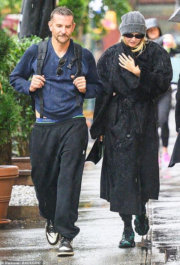 Gigi Hadid's Rainy Day Elegance: A Fashionable Stroll with Bradley Cooper