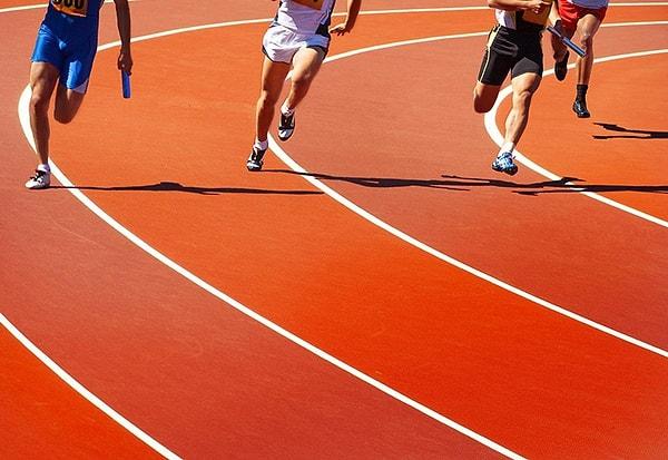 Which athlete broke the world record in the men's 100 meters race?