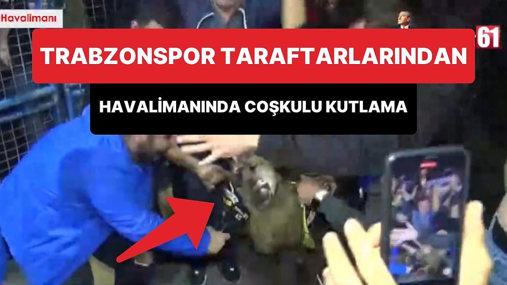 Trabzonspor Taraftarları, Fenerbahçe Galibiyetinden Dönen Takımı Fenerbahçe Atkılı Koç ile Karşıladı