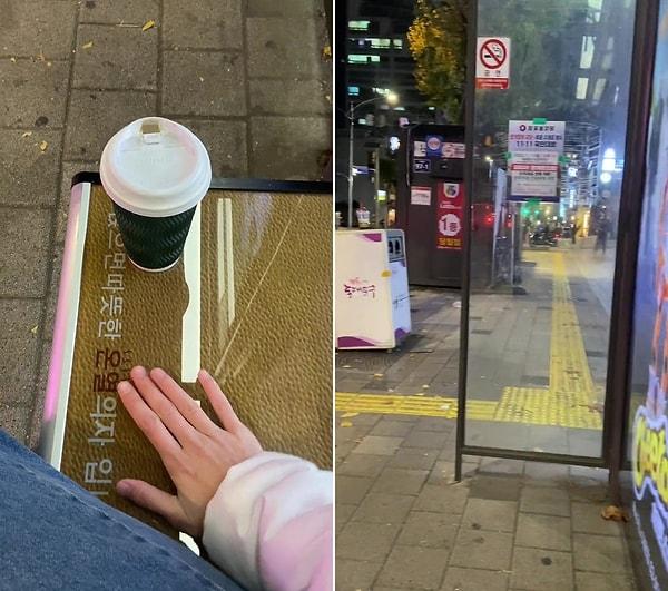 Oturma yerlerinin alttan ısıtmalı olduğunu fark eden genç, hem Güney Kore soğuğunda ısındı, hem de kahvesini ısıttı.