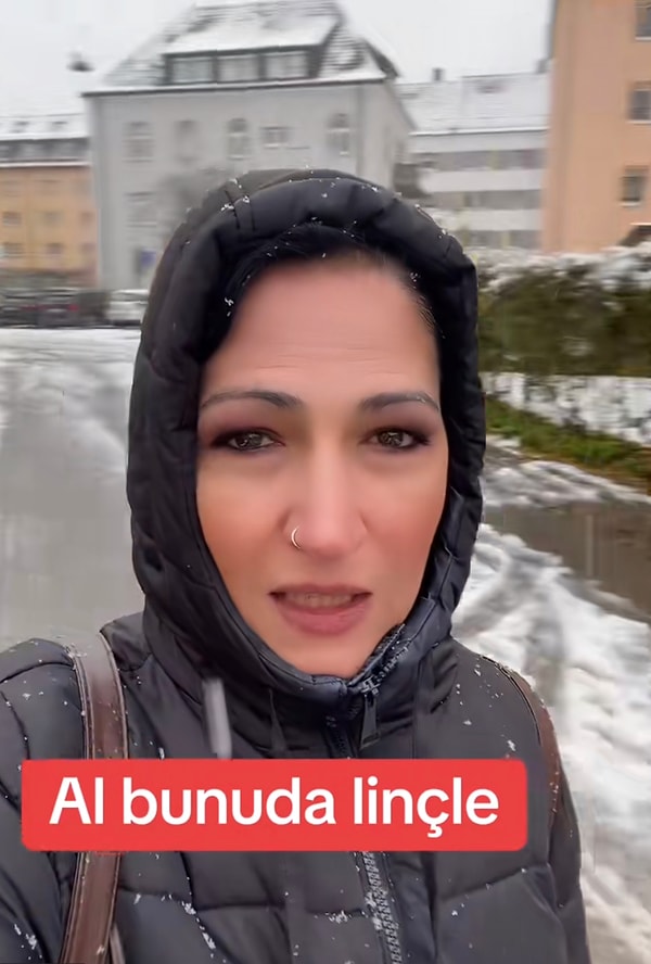 Videoya -8 derecede işe gitmek zorunda olduğunu anlatarak başlayan kadın, Almanya’da yaşamın zor olduğunu dile getirerek devam etti.