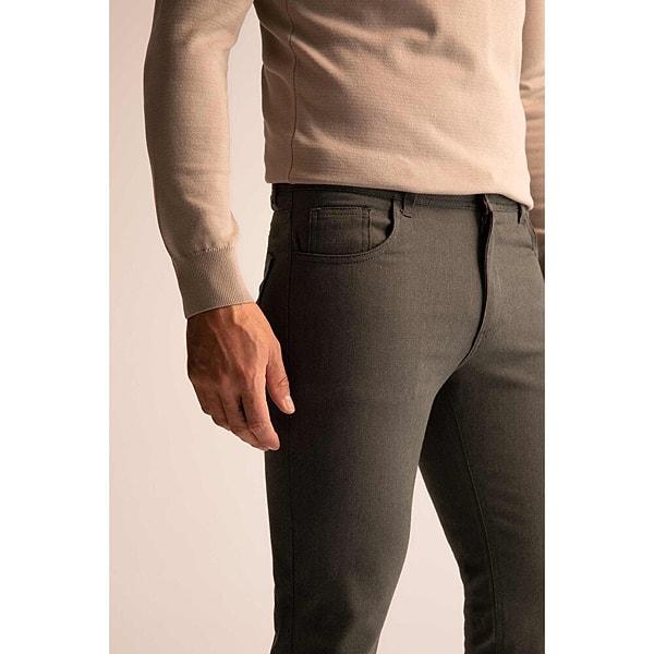 11. Dinamik ve enerjik görünmek isteyen erkeklerin tercihi DeFacto slim fit pantolon.