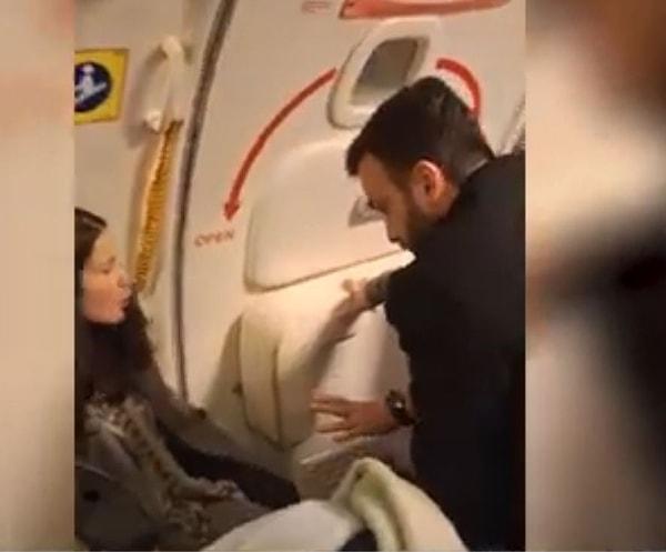 Yeniden ayağa kalkmaya çalışan alkollü kadına, yanındaki Türk yolcu müdahale edince iki kadın kavga etmeye başladı.