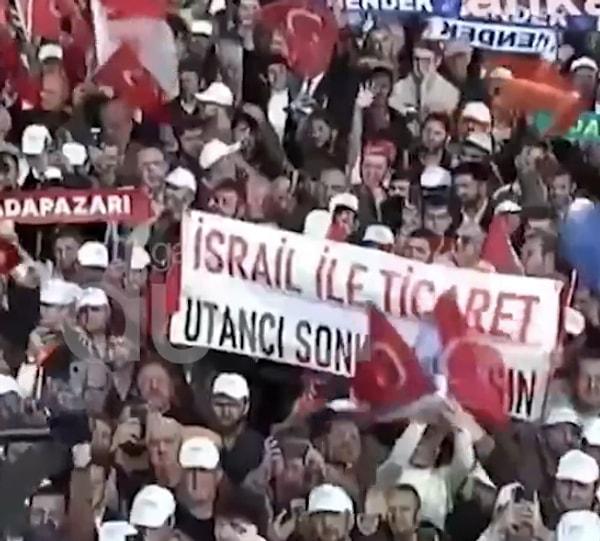 Gazete Duvar’ın paylaştığı videoya göre; miting alanında açılan ve üzerinde “İsrail ile ticaret utancı sonlandırılsın” yazan pankart kısa sürede indirildi.