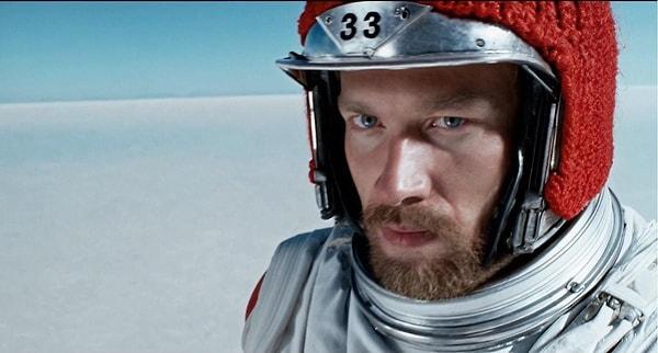 An example video created based on the input: "A movie trailer featuring a 30-year-old astronaut wearing a red knit motorcycle helmet, cinematic style, shot on 35mm film, vivid colors, set against a blue sky and a salt desert."