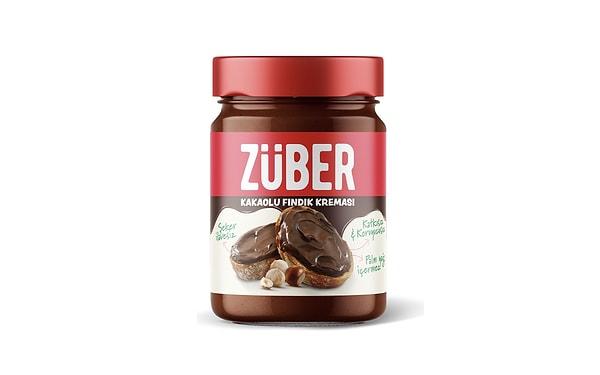 Her yerde karşımıza çıkan, masum içeriği sayesinde bütün bir kavanozu yeme isteği uyandıran Züber Fındık Kreması, bu haftanın yıldız ürünlerinden biri oldu.