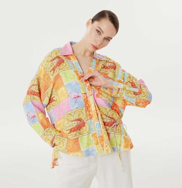 9. Twist’in baskılı bu gömlek modeli, canlı ve enerjik renklerinin yanı sıra, üzerindeki çarpıcı flamingo desenleri ile dikkat çekiyor.