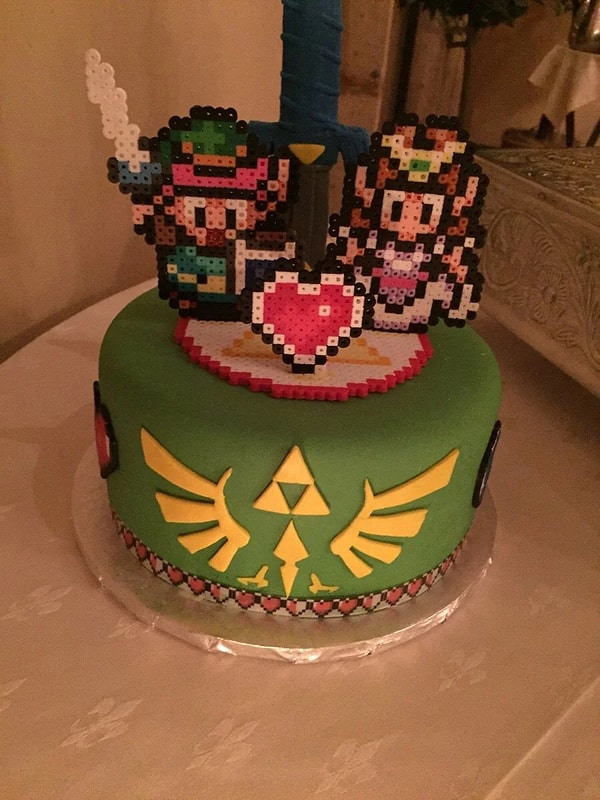 6. Oyun temalı bir düğün pastası için Zelda ve Link kesinlikle harika seçim. ❤️