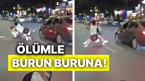 Motorla Ön Kaldırmaya Çalışan Kişi Düşünce Otomobilin Altında Kalmaktan Son Anda Kurtuldu