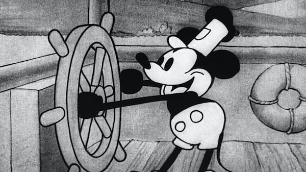 1920'lerin siyah-beyaz çizgi filmlerinde, karakterlerin ellerini belirginleştirmek animatörler için büyük bir zorluktu. İşte tam da bu dönemde, Mickey Mouse'un beyaz eldivenleri devreye girdi ve bir fenomen haline geldi.