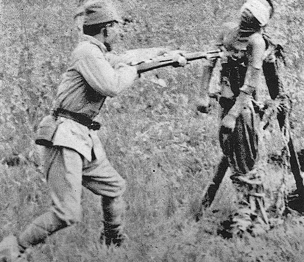 8. A soldier using an enemy for bayonet training.