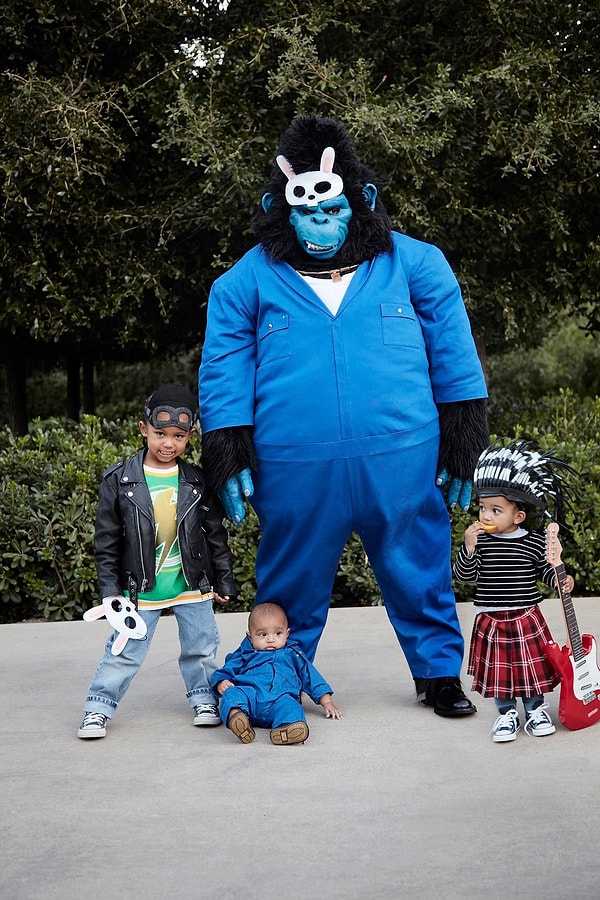 Kanye West and the kids go trick-or-treating in costumes from the movie "Sing."