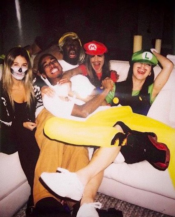 Let’s take a look... Here we see Kendall Jenner dressed as Mario (on the right).