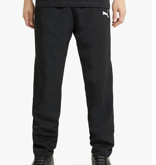 PUMA ACTIVE Woven Pants, unisex yetişkinler için tasarlanmış sofistike bir spor eşofman altı.