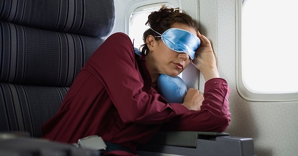 Next, avoid resting your head against the window when sleeping.