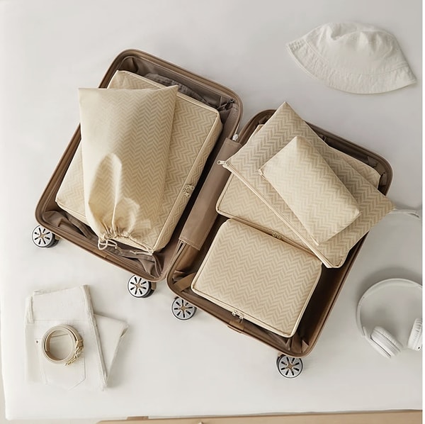 Ocean Home Textile 6'lı Bej Balıksırtı Valiz Düzenleyici Bavul İçi Organizer Set, seyahatlerinizde bavul içini düzenlemek için mükemmel bir çözüm sunuyor.