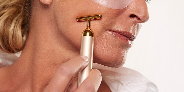 3. Do facial exercises with massage tools.