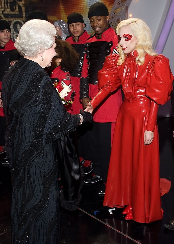 10. She even greeted Queen Elizabeth in a latex dress!