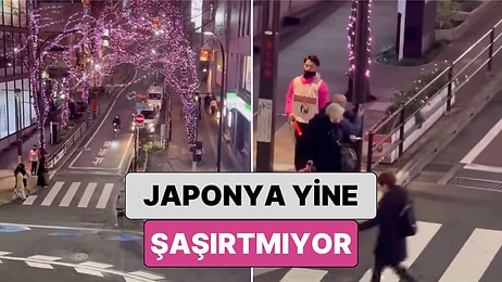 Japonya'da Bir Sokağa İnsanlar Fotoğraf Çekilirken Zarar Görmesin Diye Görevli Koydular