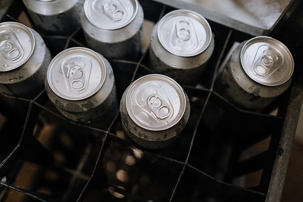 The taste of canned sodas is largely influenced by a polymer coating inside the aluminum can.