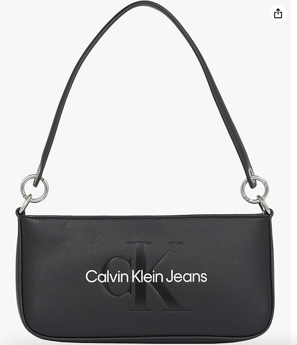 3. Amazon’da indirimde olan Calvin Klein marka bu çanta, modern tasarımıyla her kombininize uyum sağlıyor.