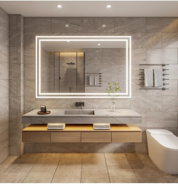 Dokunmatik aydınlatmaya sahip olan modern bir banyo aynası. Görseli