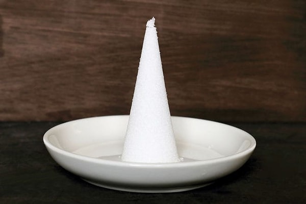 In Japan, it's common to see two small piles of salt shaped like cones in front of many restaurants, theaters, or shops.