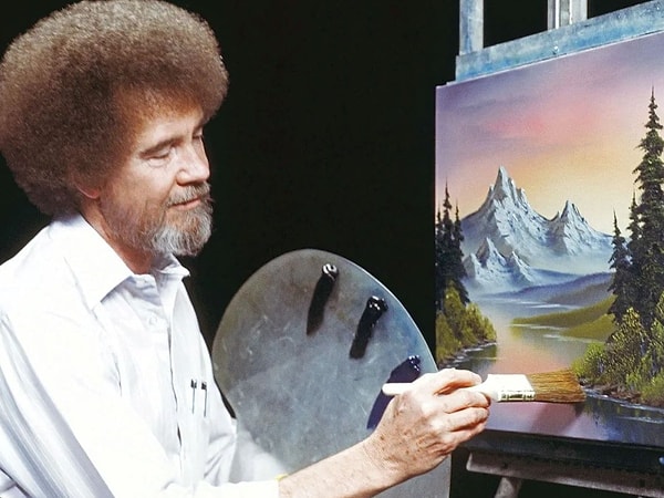 Bob Ross, pozitif enerjisi, kabarık saçları ve sakin sesiyle sanatseverlerin kalbinde yer etti.