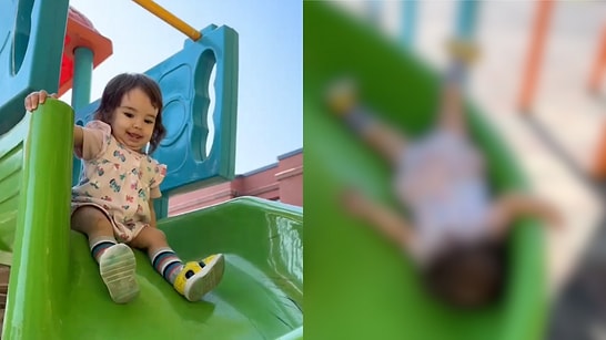 A Little Girl Who Sits Down Normally On The Slide But Gets Off In A Different Way