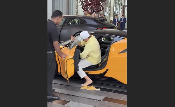 Why do luxury car owners remove their shoes before getting into their vehicles?